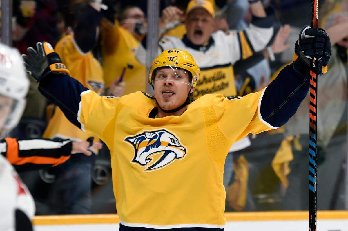 Nashville Predators center Mikael Granlund (64) celebrates after scoring a goal against the Carolina Hurricanes during the second period in Game 6 of an NHL hockey Stanley Cup first-round playoff series Thursday, May 27, 2021, in Nashville.