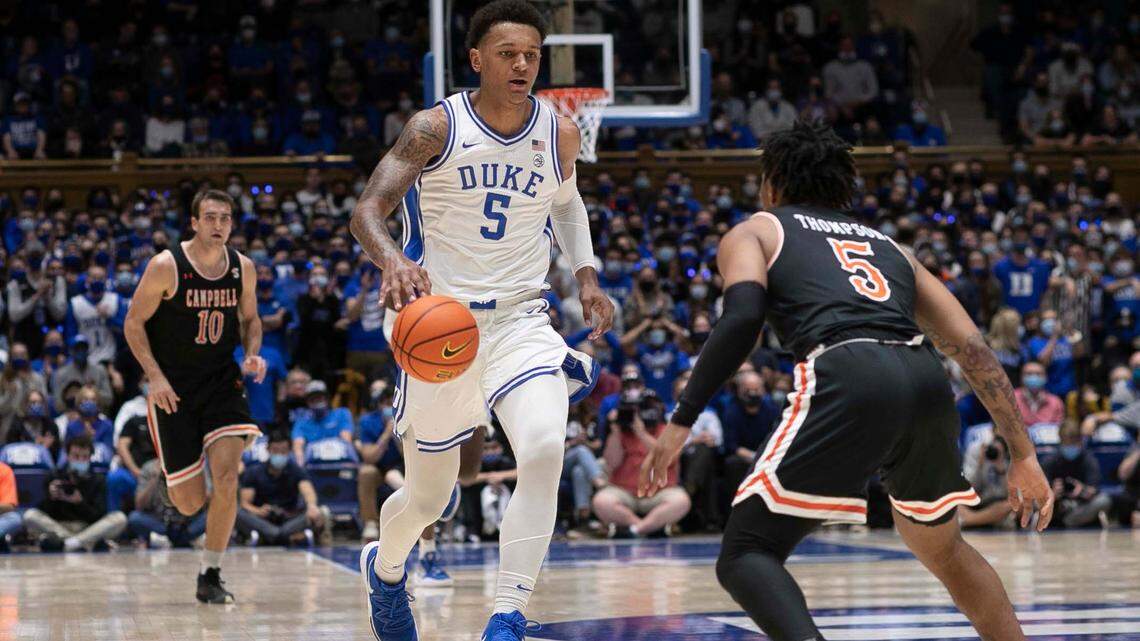 Duke’s Paolo Banchero (5) drives against Campbell’s Messiah Thompson (5) in the first half on Saturday, November 13, 2021 at Cameron Indoor Stadium in Durham, N.C.