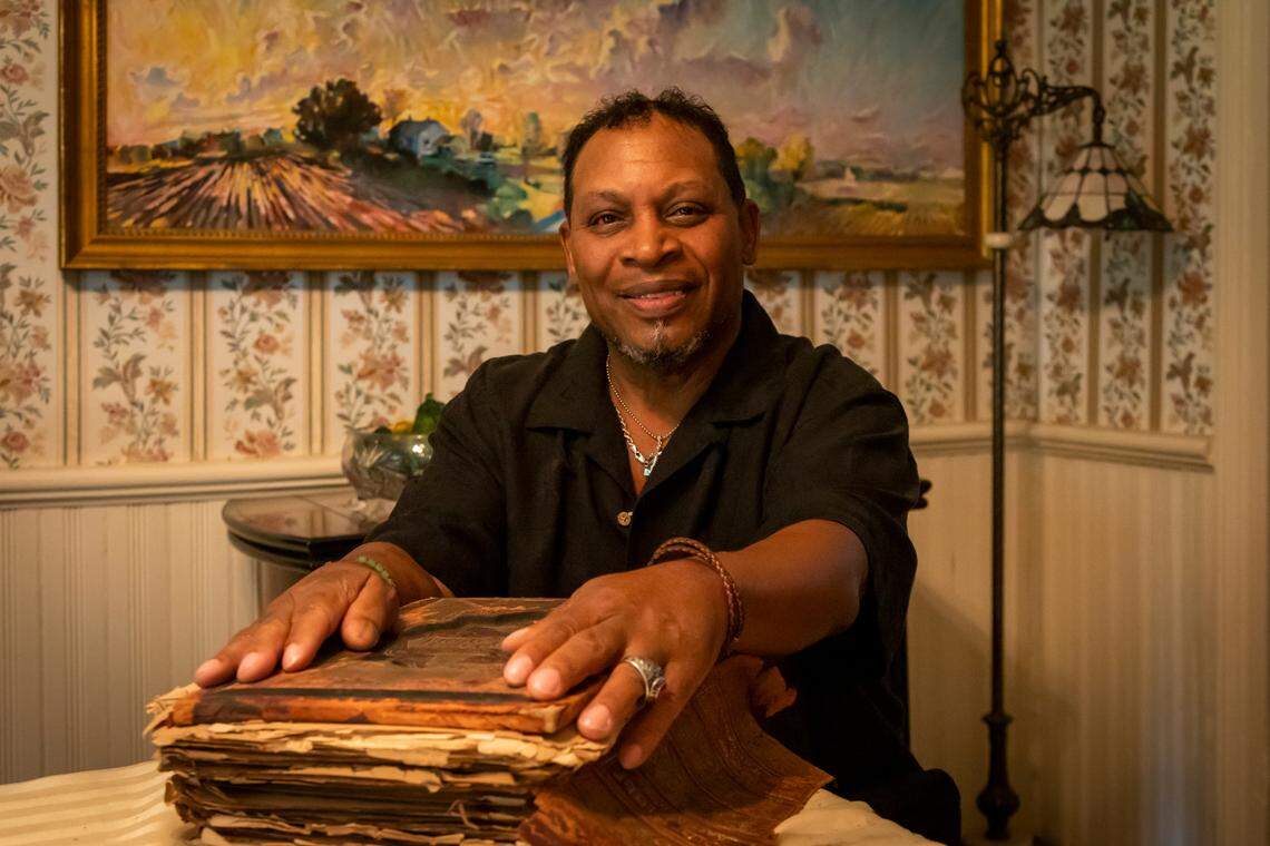 Portrait of Alexander Kelley in the ‘Voices of Oberlin,’ an exhibit displaying the stories of elders who grew up in one of North Carolina’s longest-surviving Black freedman’s villages. Kelley’s portrait is one of 20 located in the Raleigh Municipal building’s Block Gallery. Photo by Teresa Moore.