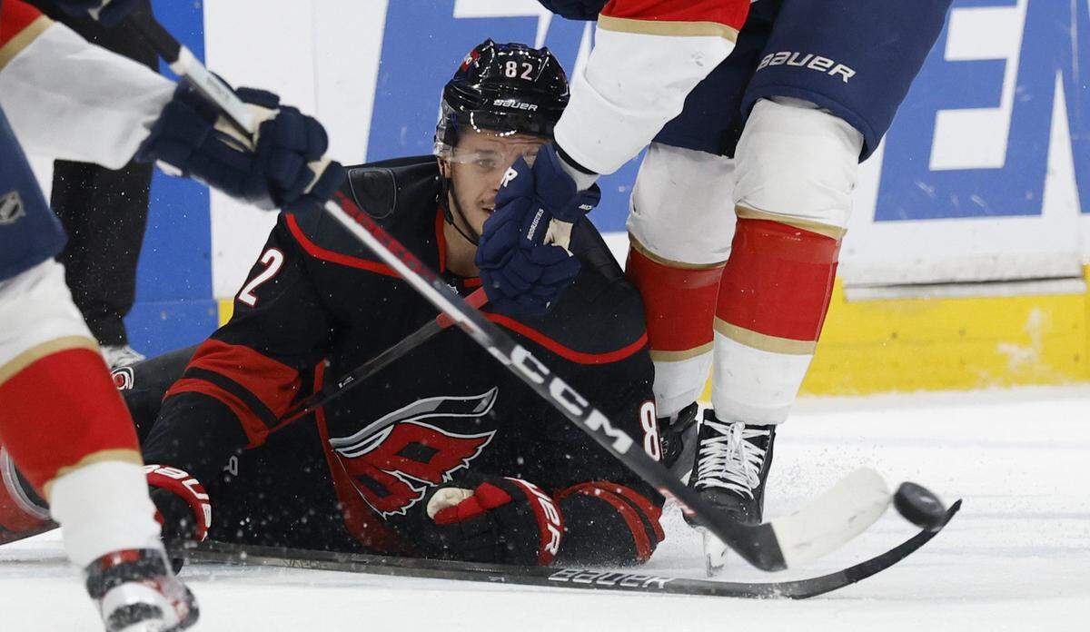 Carolina’s Jesperi Kotkaniemi (82) keeps his eye on the puck during the first period of the Carolina Hurricanes’ game against the Florida Panthers in Game 1 of the Eastern Conference Finals at the Lenovo Center in Raleigh, N.C., Tuesday, May 20, 2025.