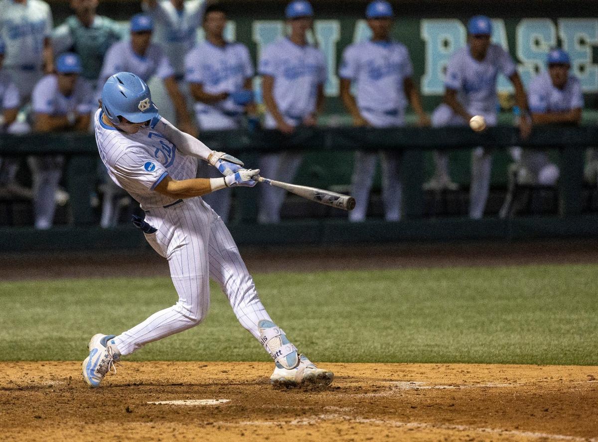 North Carolina’s Vance Honeycutt (7) connects for a 2 RBI walk-off home run in the ninth inning to defeat West Virginia 8-6 during the NCAA Super Regional on Friday, June 7, 2024 at Boshamer Stadium in Chapel Hill, N.C.
