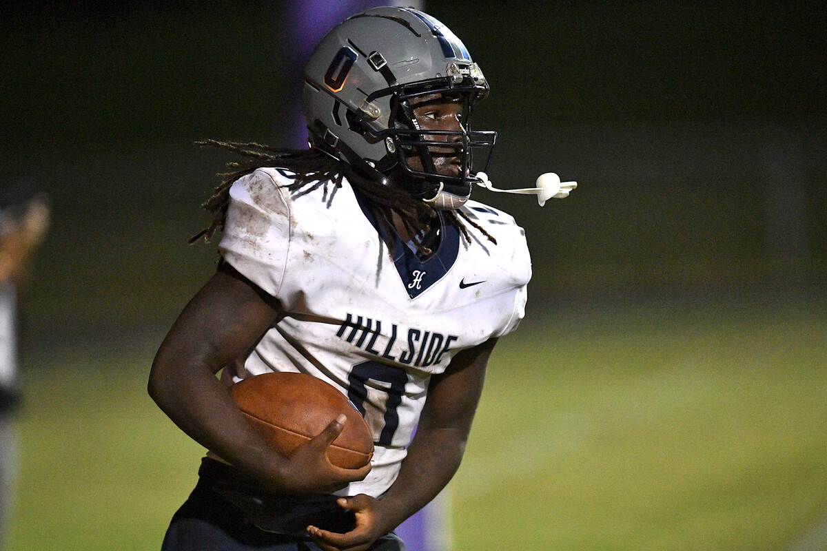 Hillside running back Jacori Douglas (0) in the end zone after scoring the touchdown against Riverside during the first half. The Durham Hillside Hornets and the Durham-Riverside Pirates met in a football game in Durham. N.C. on October 4, 2024.