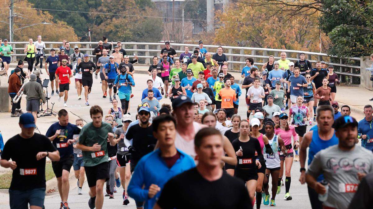 Runners head down S. Boylan Ave during the City of Oaks Marathon in Raleigh, N.C., Sunday, Nov. 5, 2023.