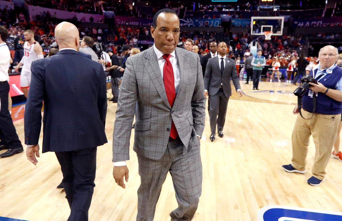 N.C. State head coach Kevin Keatts walks off the court after Virginia’s 76-56 victory over N.C. State in the quarterfinals of the 2019 ACC Tournament in Charlotte, N.C., Thursday, March 14, 2019.