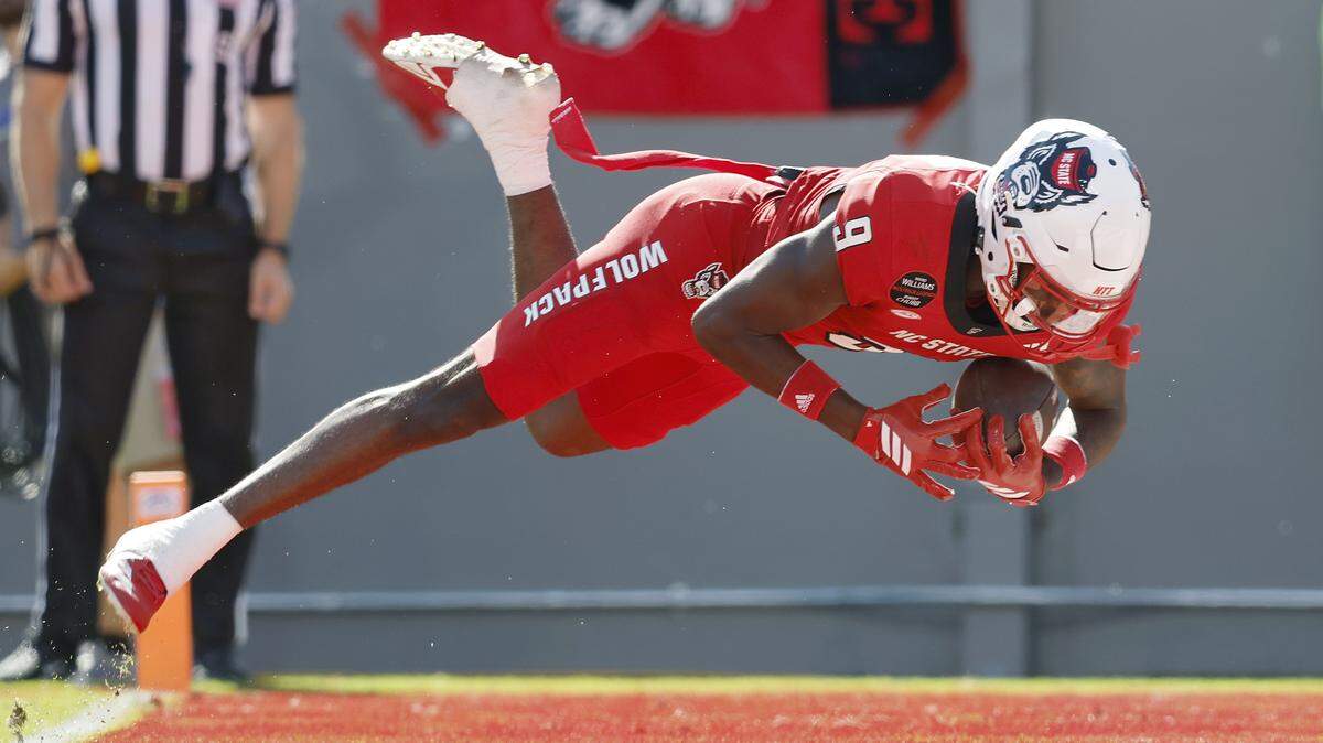 N.C. State’s Terrell Anderson jumps into the end zone to score a touchdown during the first half of the Wolfpack’s game against Campbell on Saturday, Oct. 4, 2025, at Carter-Finley Stadium in Raleigh, N.C.