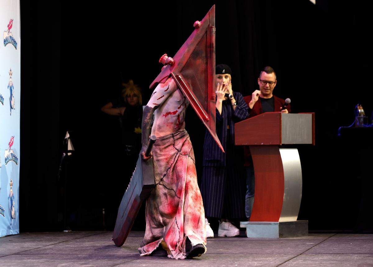 Kamden Norfleet from Wake Forest takes to the stage as Pyramid Head from Silent Hill during the costume competition at GalaxyCon Raleigh at the Raleigh Convention Center Saturday, July 27, 2024.