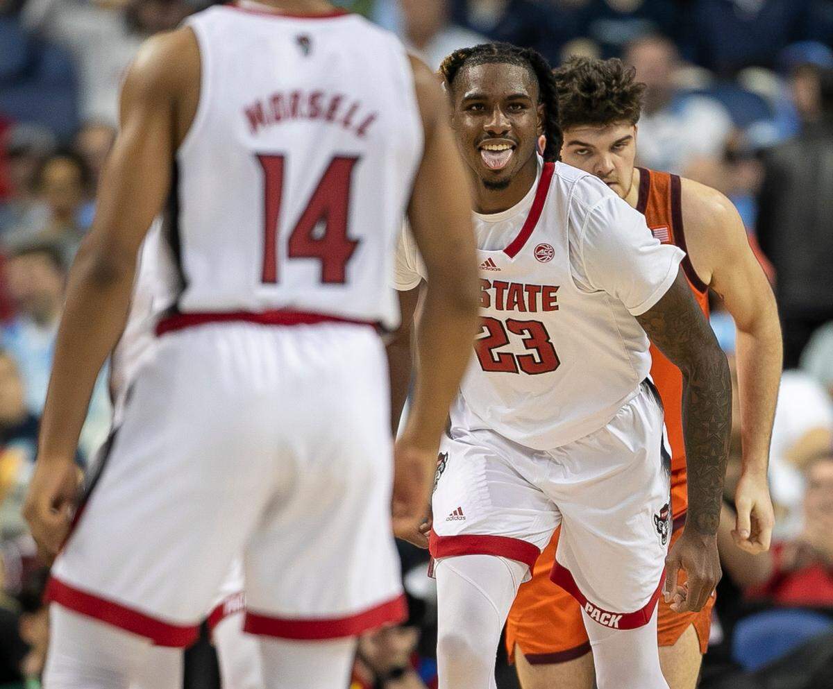 N.C. State’s Greg Gantt (23) reacts after scoring in the first half against Virginia Tech in the second round of the ACC Tournament on Wednesday, March 8, 2023 at the Greensboro Coliseum in Greensboro, N.C.