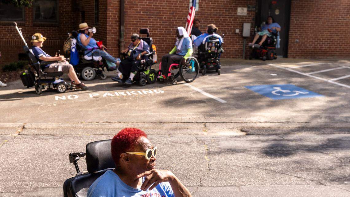 People in wheelchairs block exterior doors of the NC Department of Health and Human Services building in Raleigh at times chanting “I’d rather go to jail than to die in a nursing home.” Protesters with the National ADAPT organization demanded improved service and support and an opportunity to speak with NC DHHS Sec. Kody Kinsley. At around 6 p.m. police left the scene without arrests.