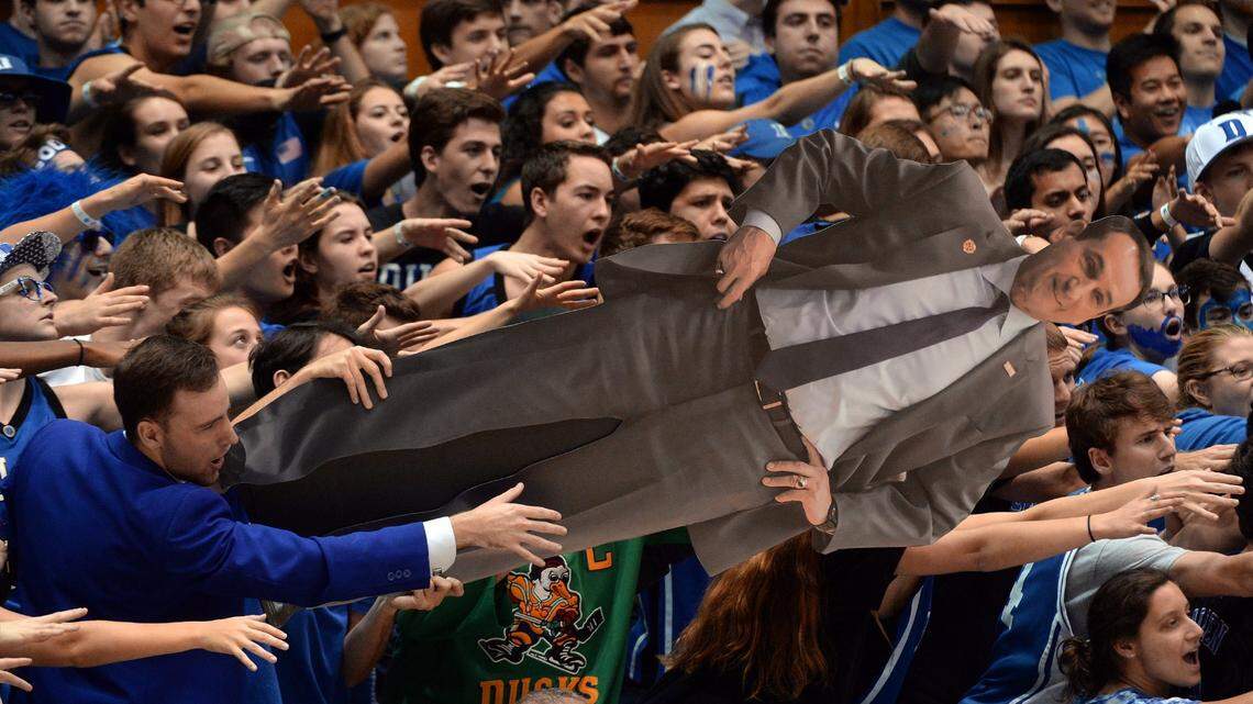 Cameron Crazies hold a cutout of Coach Mike Krzyzewski as they try to encourage the Blue Devils against N.C. State in the second half. N.C. State upset Duke 84-82 at Cameron Indoor Stadium in Durham, N.C. , Monday, Jan. 23, 2017