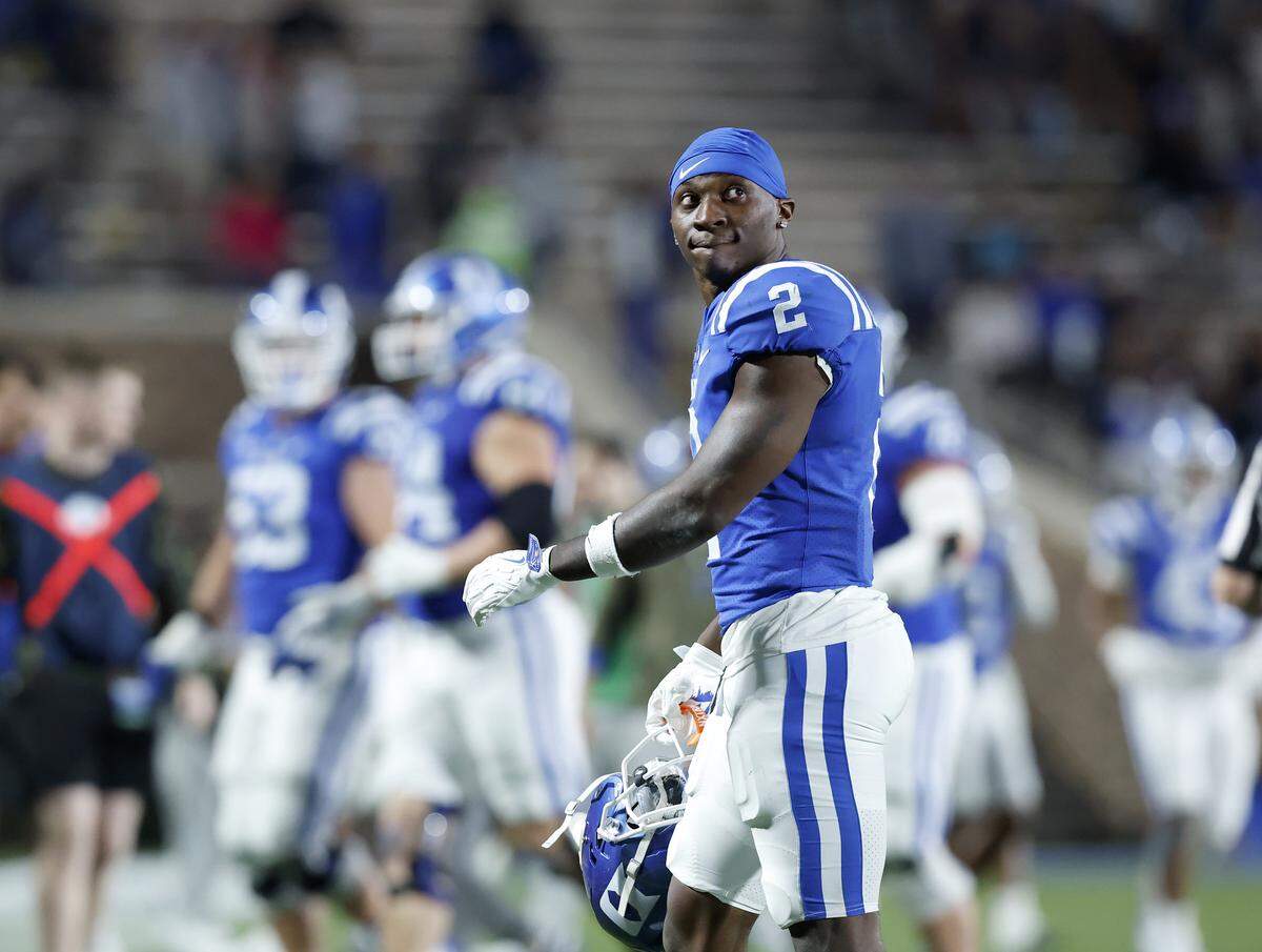 Duke’s Sahmir Hagans walks off the field in the closing minutes of the Blue Devils’ 34-17 loss to Virginia on Saturday, Nov. 15, 2025, at Wallace Wade Stadium in Durham, N.C.