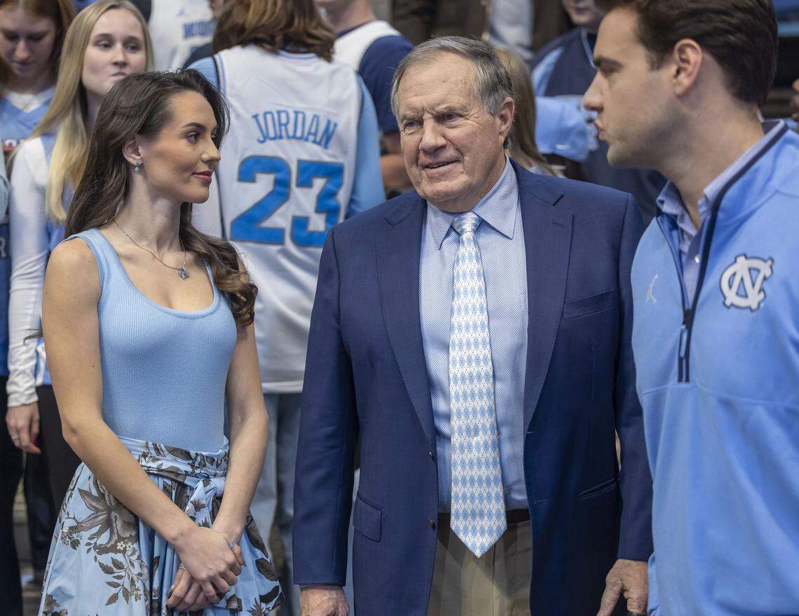 North Carolina football coach Bill Belichick and Jordon Hudson attend the men’s basketball game against Stanford on Saturday, January 18, 2025 at the Smith Center in Chapel Hill, N.C. 