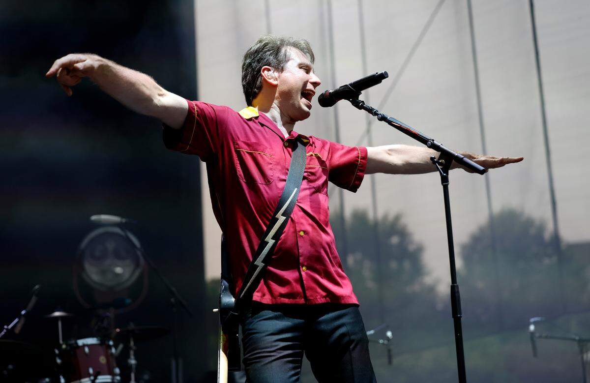 Singer Alexander Kapranosas sings as Franz Ferdinand opens for the Pixies during a concert at Red Hat Amphitheater in Raleigh, N.C., Friday, June 16, 2023.