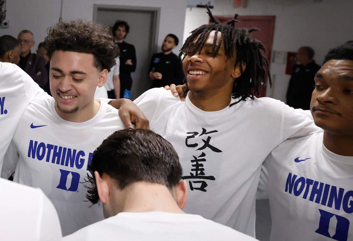 Duke’s Isaiah Evans wears a shirt with Kaizen written on it as the team huddles before Duke’s game against Mount St. Mary’s in the first round of the 2025 NCAA Men’s Basketball Tournament at the Lenovo Center in Raleigh, N.C., Friday, March 21, 2025.