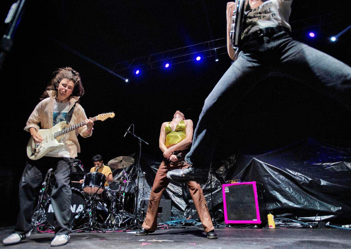 MUNA opens for Phoebe Bridgers in concert at Raleigh, N.C.’s Red Hat Amphitheater Tuesday night, Sept. 21, 2021.