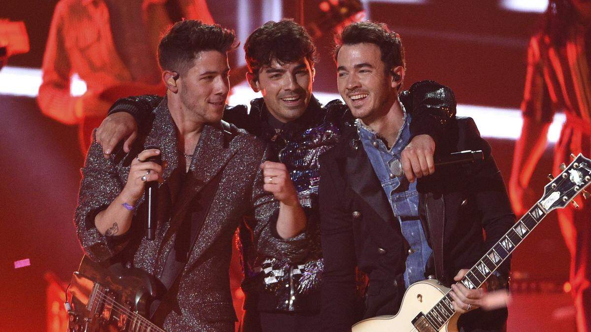 The Jonas Brothers, made up of Nick Jonas, left, Joe Jonas and Kevin Jonas, will bring their tour to Raleigh’s PNC Arena Aug. 14.