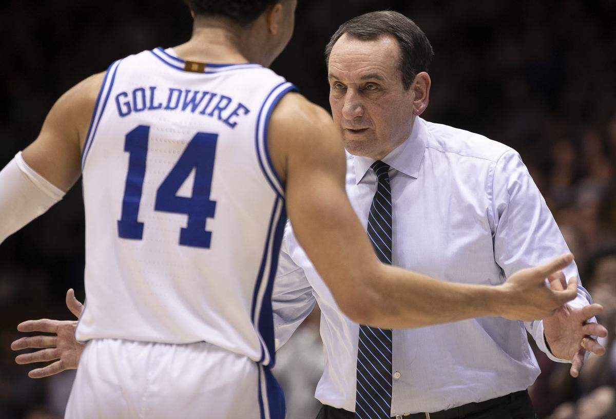 Duke coach Mike Krzyzewski talks with Jordan Goldwire (14) during the second half against N.C. State on Monday, March 2, 2020 at Cameron Indoor Stadium in Durham, N.C.