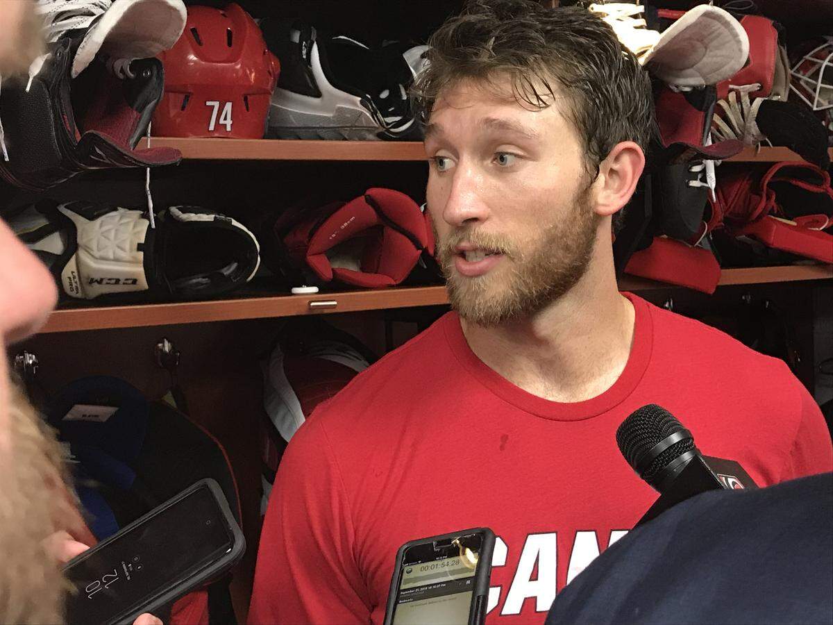 Carolina Hurricanes defenseman Jaccob Slavin talks with media after his goal and two assists helped spur 5-1 preseason win over the Washington Capitals on Sept. 21, 2018.