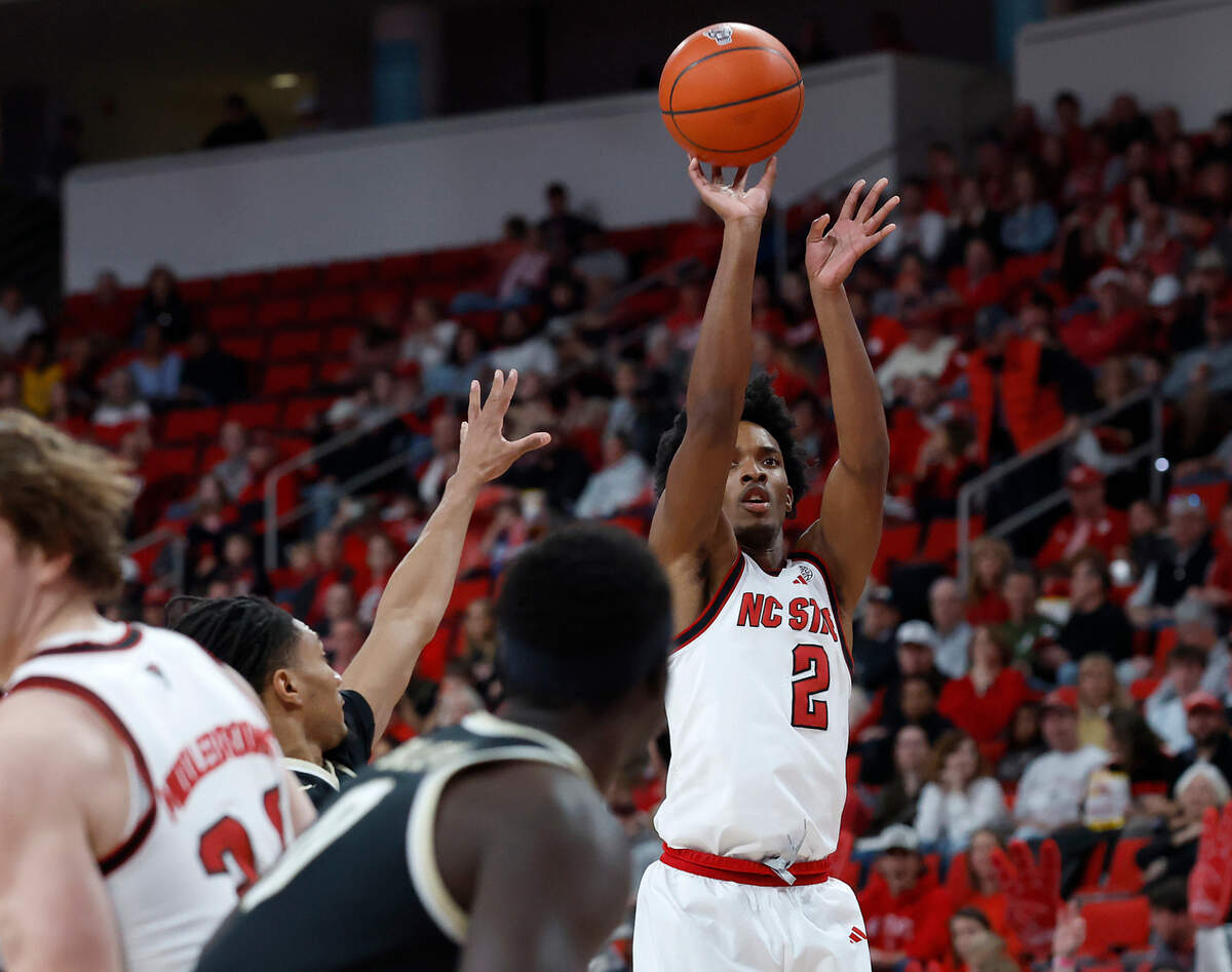 N.C. State’s Paul McNeil puts up a shot during the first half of the Wolfpack’s 85-73 win over Wake Forest on Saturday, Feb. 22, 2025, at Lenovo Center in Raleigh, N.C.