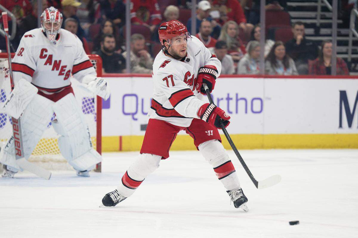 Carolina Hurricanes defenseman Tony DeAngelo (77) skates against the Chicago Blackhawks at United Center. 