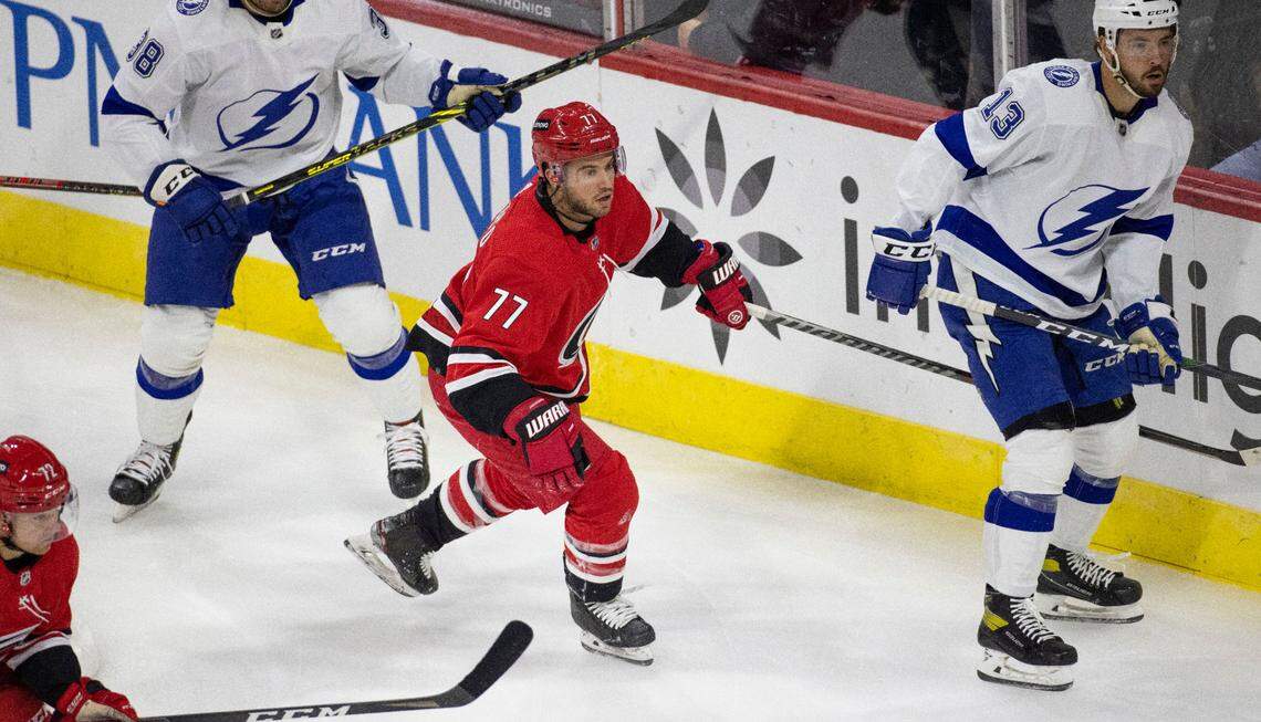 Carolina Hurricanes’ Tony DeAngelo (77) skates during an NHL exhibition game against Tampa Bay on Tuesday, September 28, 2021 at PNC Arena in Raleigh, N.C.