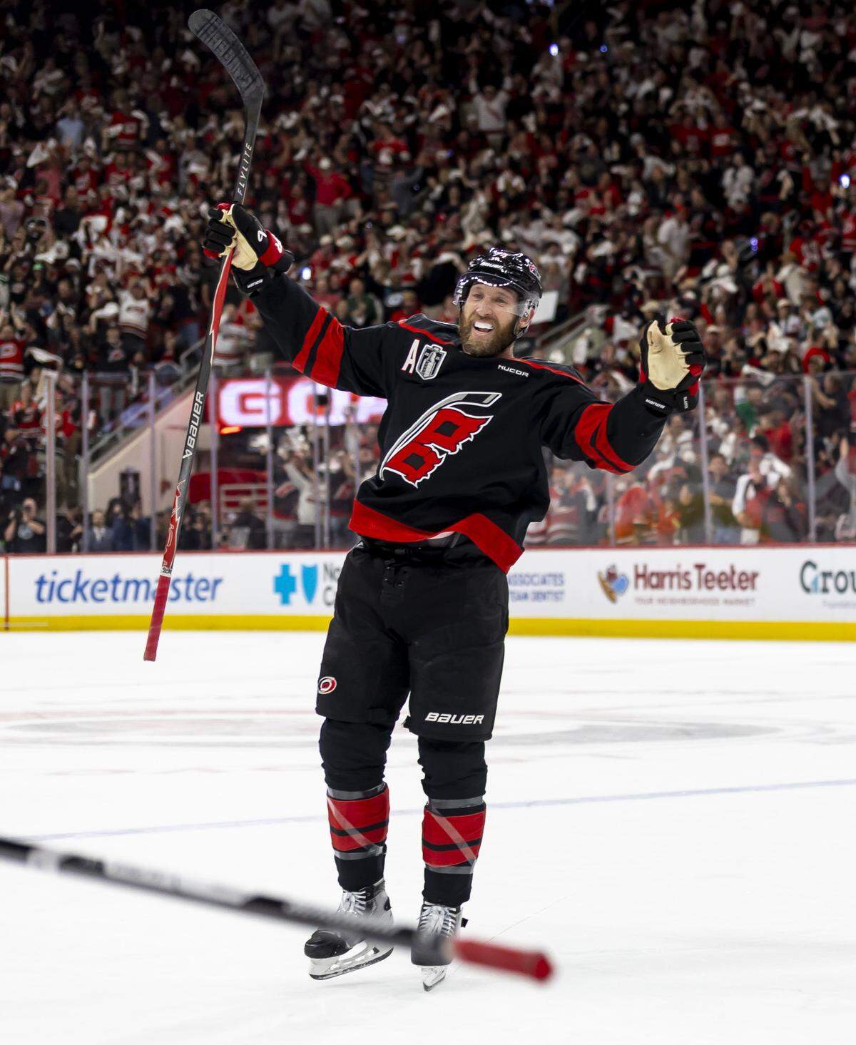 Carolina defenseman Jacoob Slavin (74) celebrates after a goal by Nikolaj Ehlers to take a 2-0 lead over Las Vegas in the first period in Game 1 of the Stanley Cup Finals, on Tuesday, June 2, 2026 at Lenovo Center in Raleigh, N.C.