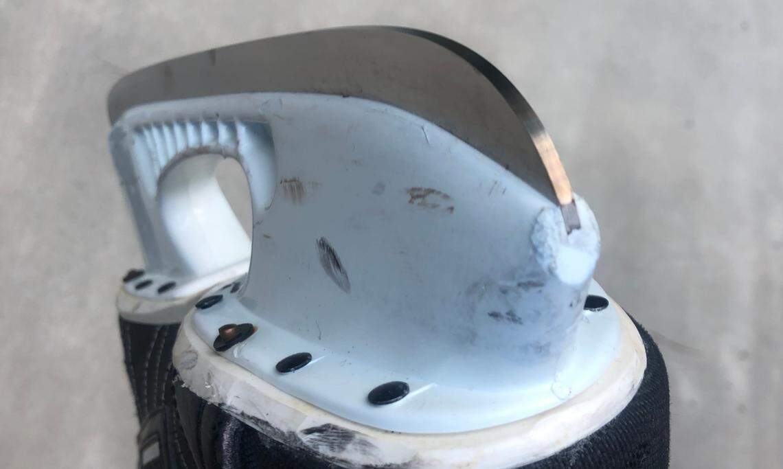 A hockey skate blade has a delicate hollow cut down the middle to give it two edges instead of one. This blade is on a skate formerly worn by one-time Hurricanes defenseman Bret Hedican.