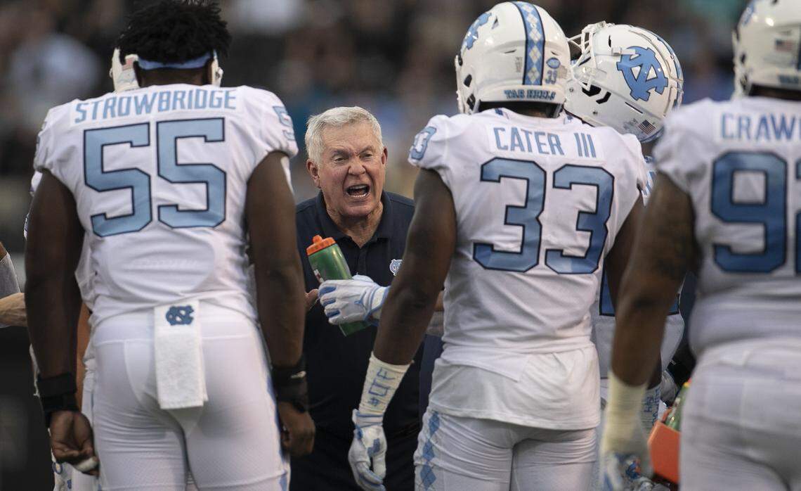Down 7-0 to Wake Forest at the start of the second quarter, North Carolina coach Mack Brown has a word with the defensive unit on Friday, September 13, 2019 at BB&T Field in Winston-Salem, N.C.