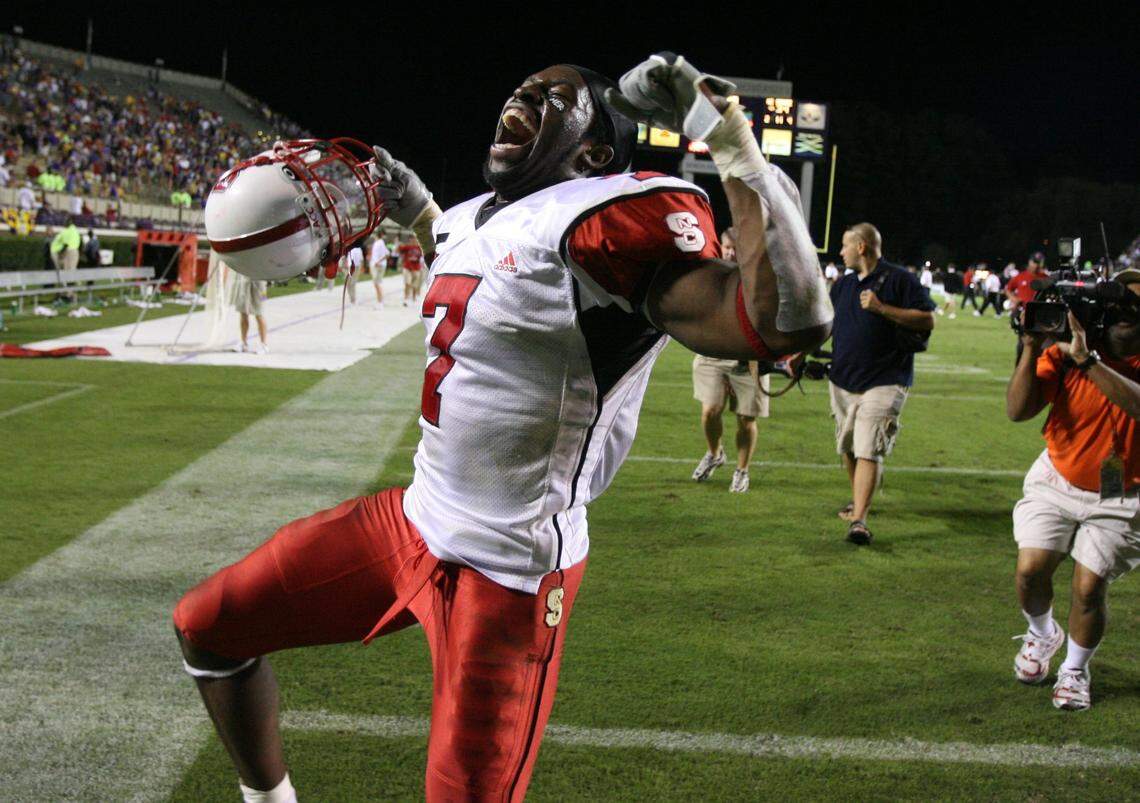 N.C. State’s DaJuan Morgan celebrates after the Wolfpack defeated ECU 34-20 at Dowdy-Ficklen Stadium in Greenville in 2007
