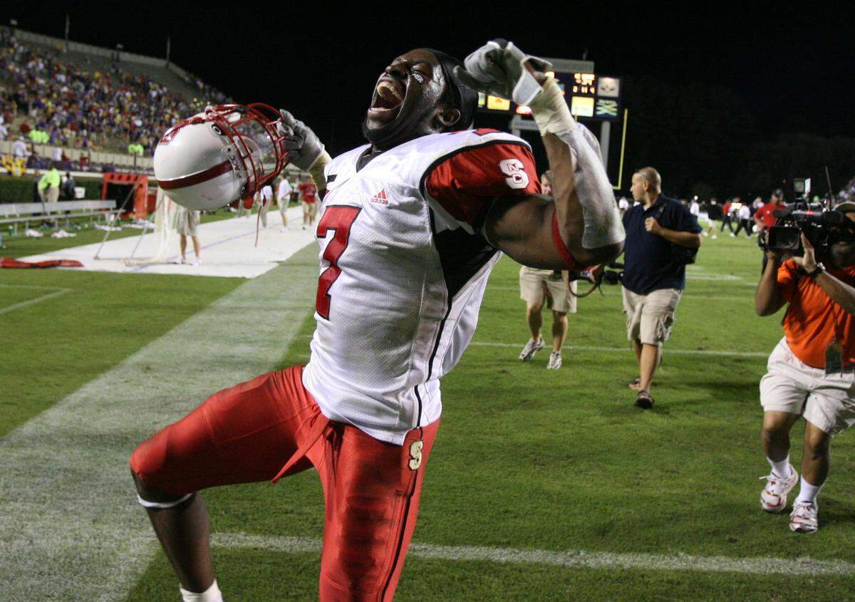 N.C. State’s DaJuan Morgan celebrates after the Wolfpack defeated ECU 34-20 at Dowdy-Ficklen Stadium in Greenville in 2007