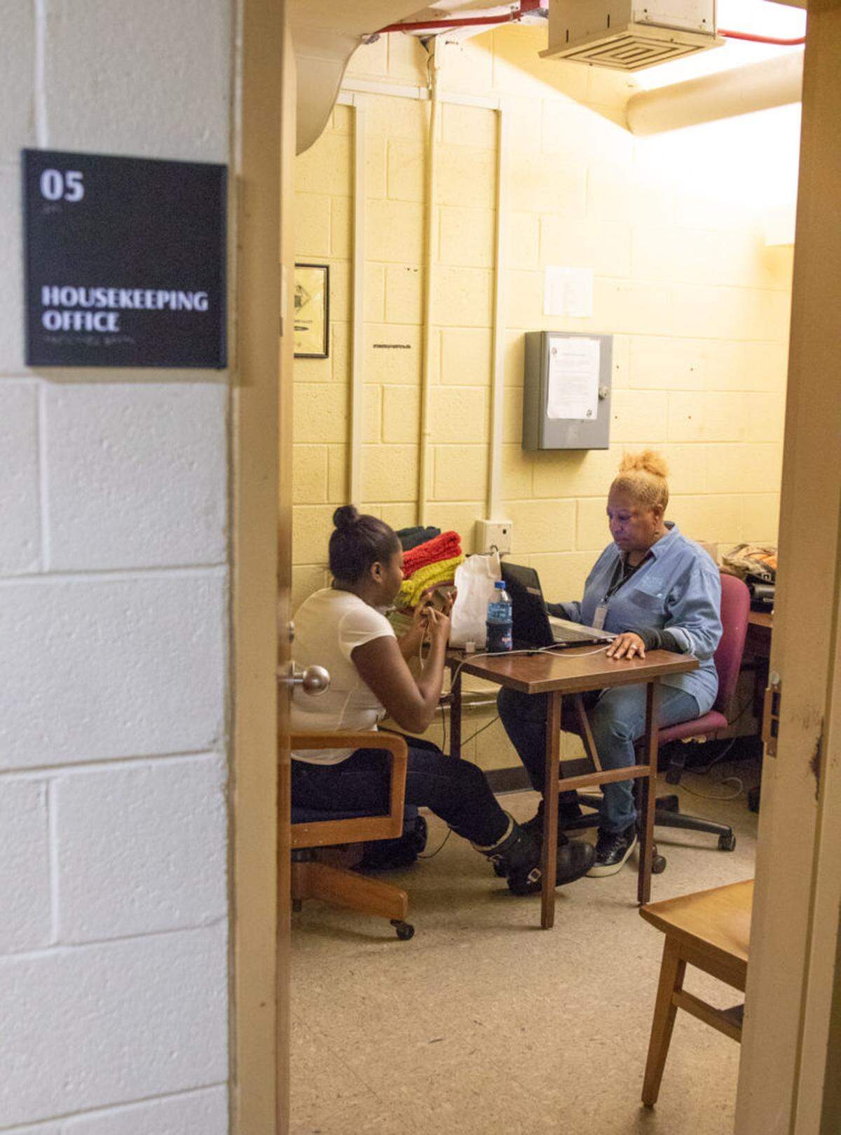 Faye Alston and her daughter Precious eat lunch the housekeeping office at UNC-Chapel Hill.
