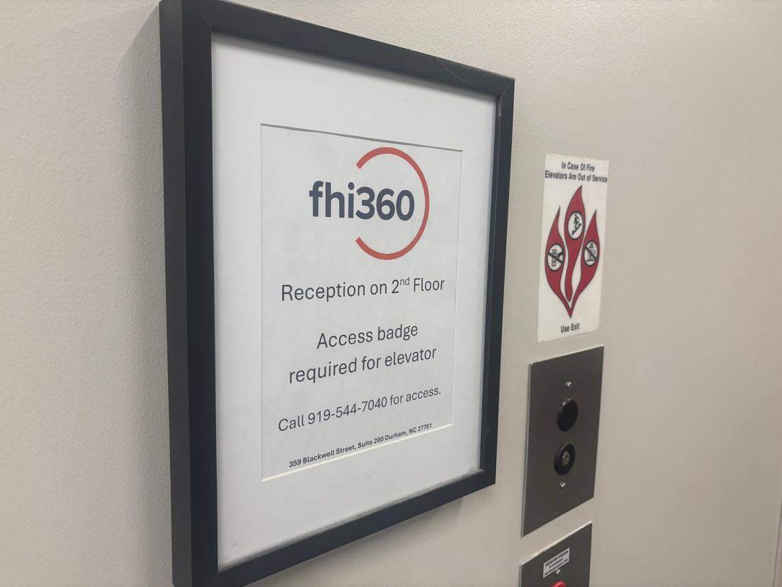 A sign directing visitors to the main FHI 360 offices in downtown Durham, North Carolina.