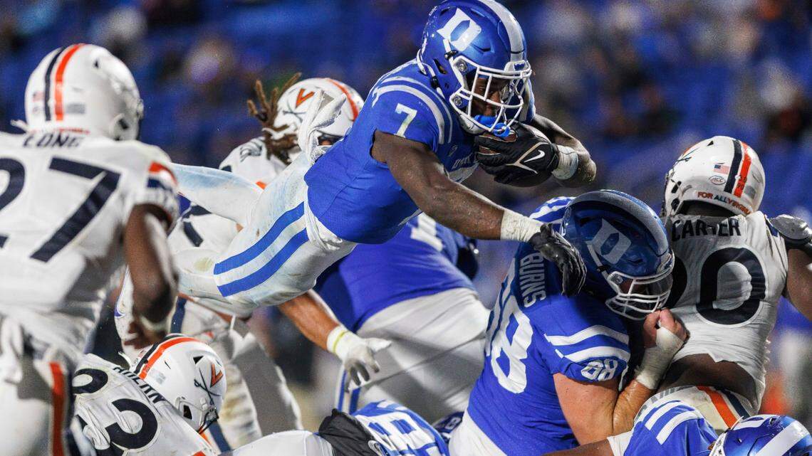 Duke’s Jordan Waters (7) leaps for a touchdown during the first half of the team’s NCAA college football game against Virginia in Durham, N.C., Saturday, Oct. 1, 2022. (AP Photo/Ben McKeown)
