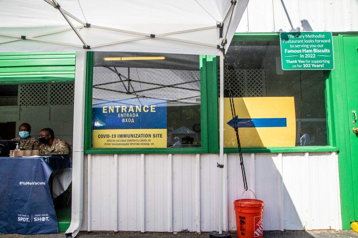 The Cary Methodist Church booth, the oldest vendor at the State Fair, bowed out this year. In its place is a free vaccination booth.