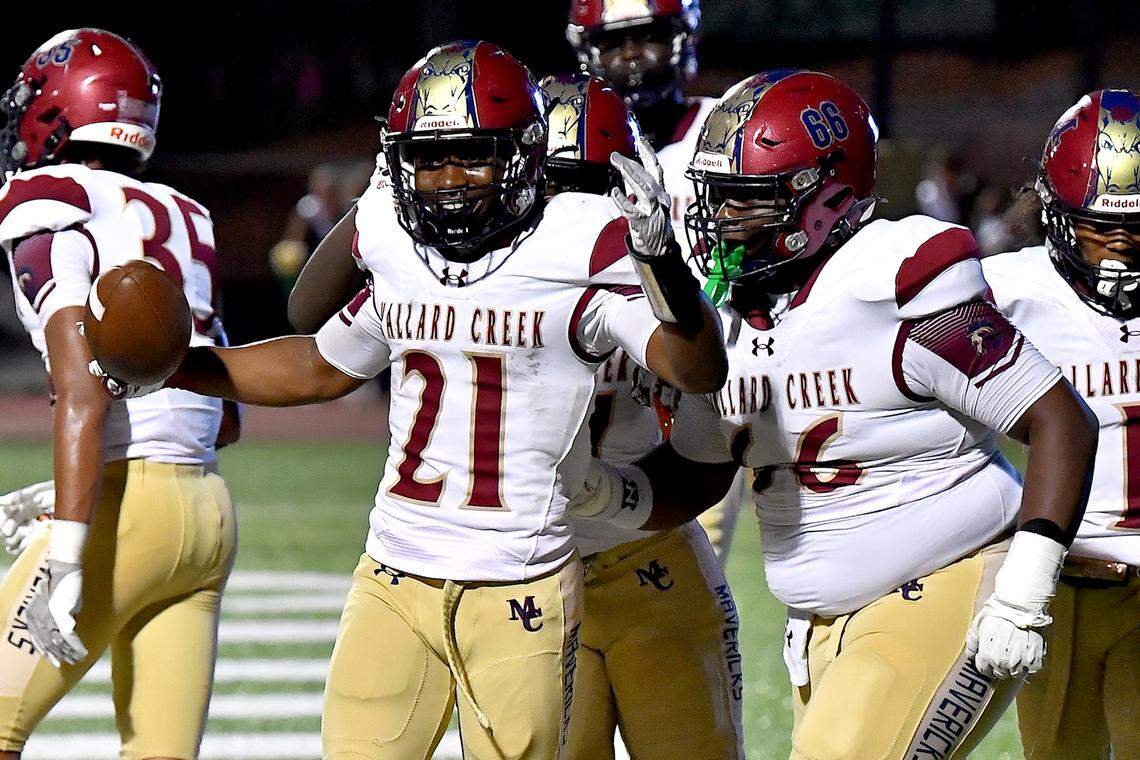 Mallard Creek running back Xavier Edmond (21) celebrates his touchdown against Cardinal Gibbons during the first half.  The Mallard Creek Mavericks and the Cardinal Gibbons Crusaders met in a non-conference football game in Raleigh, N.C. September 19, 2025