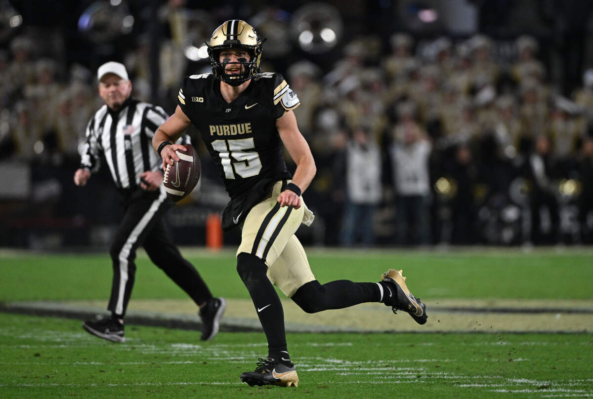 Purdue Boilermakers quarterback Ryan Browne (15) runs the ball during the second half against the Penn State Nittany Lions at Ross-Ade Stadium.