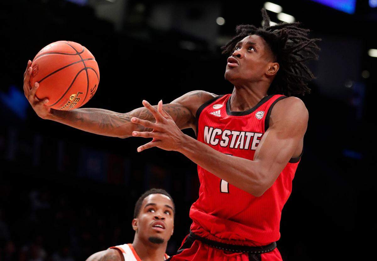 N.C. State’s Dereon Seabron (1) heads to the basket during the second half of Clemson’s 70-64 victory over N.C. State in the first round of the ACC men’s basketball tournament at the Barclays Center in Brooklyn, N.Y., Tuesday, March 8, 2022.