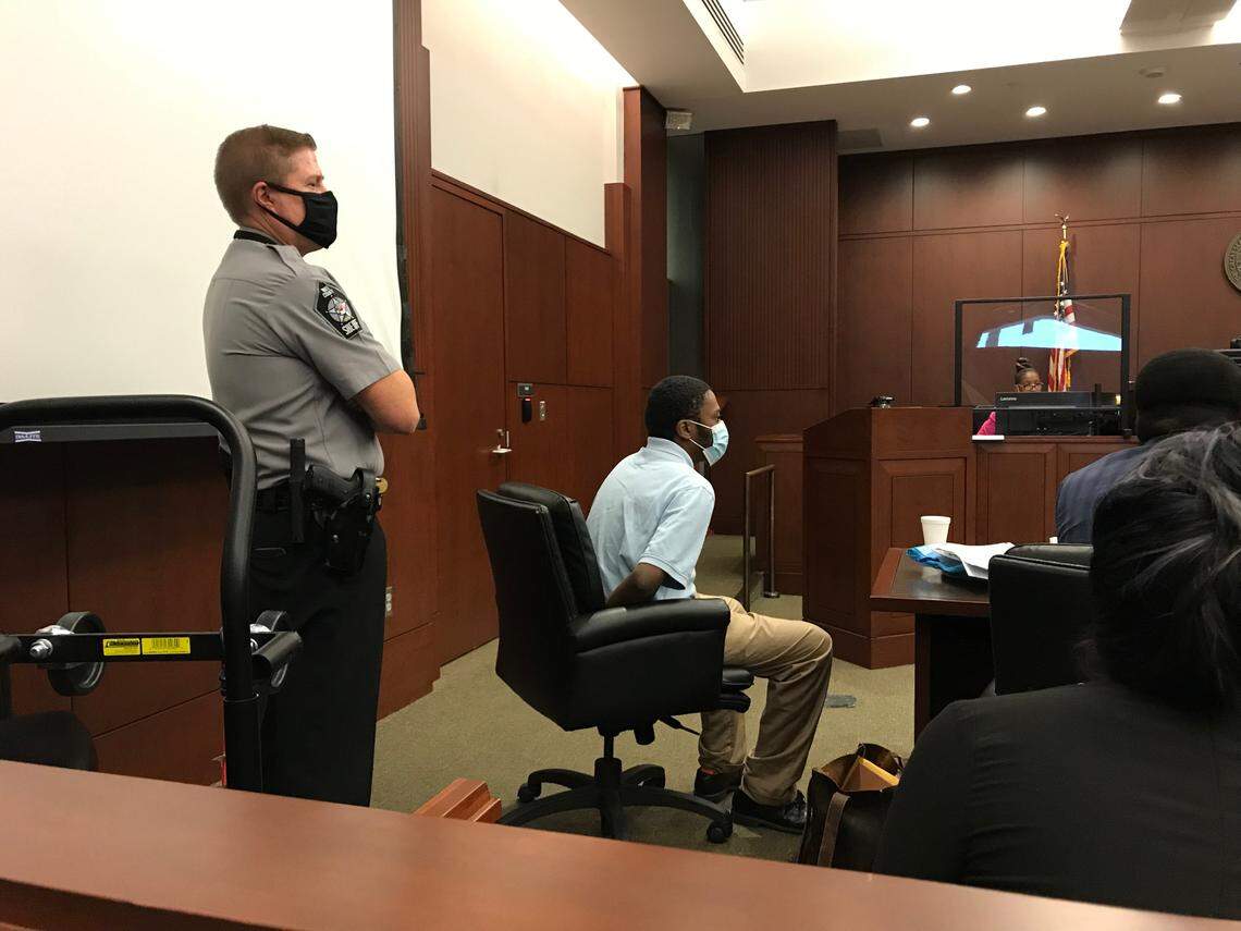 Kendrick Gregory, 26, sits handcuffed in the courtroom at the Wake County Justice Center on Tuesday, August 3, 2021, after jurors found him guilty of multiple charges including first-degree murder and first-degree rape.