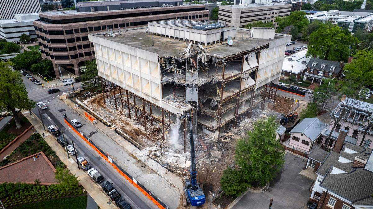 The site of the Bath Building will be left as open space for the foreseeable future. The N.C. Freedom Park is seen left, across East Lane Street.