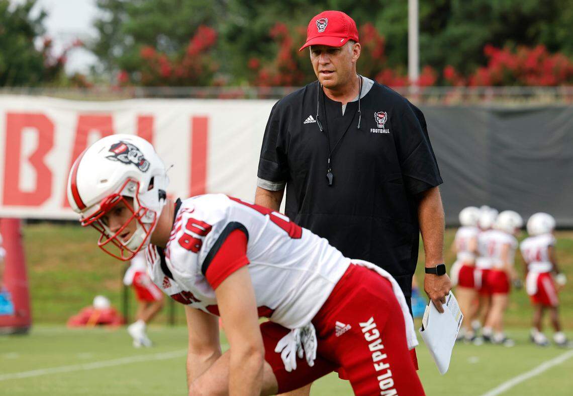 N.C. State head coach Dave Doeren watches as wide receiver Bradley Rozner (80) prepares to run a drill during the Wolfpack’s first fall practice in Raleigh, N.C., Wednesday, August 2, 2023.