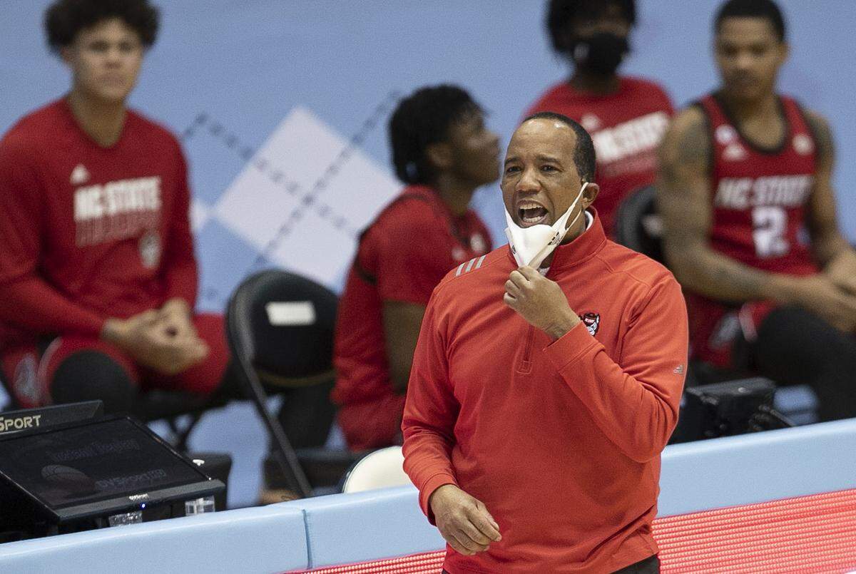 N.C. State coach Kevin Keatts directs his team on defense in the second half against North Carolina on Saturday, January 23, 2021 at the Smith Center in Chapel Hill, NC.