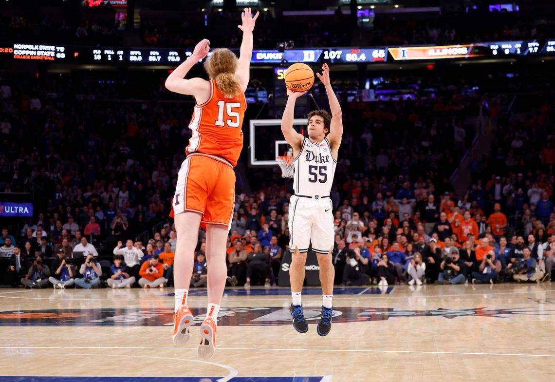 Duke’s Spencer Hubbard (55) shoots a three-pointer as Illinois’ Jake Davis (15) defends during the second half of Duke’s 110-67 victory over Illinois in the SentinelOne Classic at Madison Square Garden in New York City Saturday, Feb. 22, 2025.