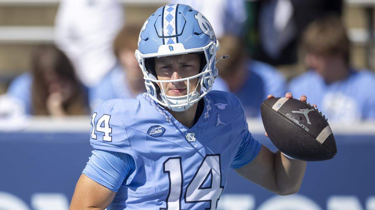 North Carolina quarterback Max Johnson (14) warms up for the Tar Heels’ game against Clemson on Saturday, October 4, 2025 at Kenan Stadium in Chapel Hill, N.C. Johnson is expected to start in place of Gio Lopez after he was injured two weeks ago against UCF. 