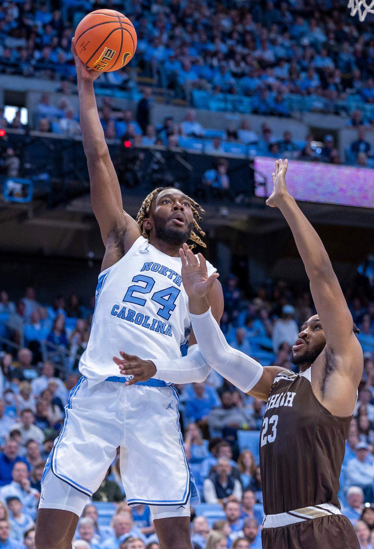 North Carolina’s Jae’Lyn Withers (24) puts up a shot against Lehigh’s Bube Momah (23) in the first half on Sunday, November 12, 2023 at the Smith Center in Chapel Hill, N.C.