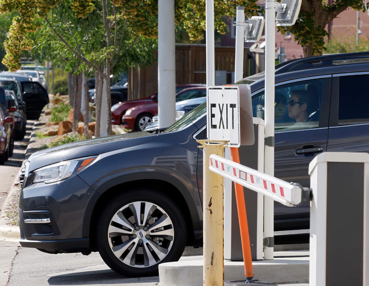 A vehicle exits the Corcoran Street Parking Garage on the afternoon of Tuesday, August 2, 2022, in Durham, N.C.