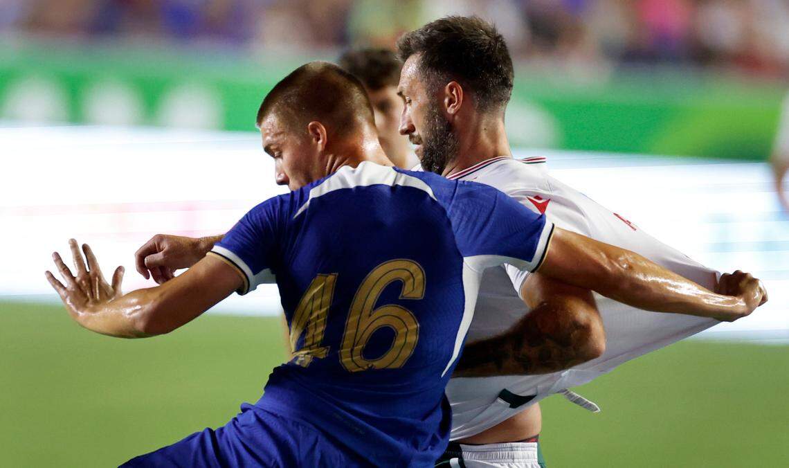Chelsea’s Alfie Gilchrist (46) tries to slow down Wrexham’s Ollie Palmer during the second half of Chelsea Football Club’s 5-0 victory over Wrexham AFC in a friendly match at Kenan Stadium in Chapel Hill, N.C., Wednesday, July 19, 2023.