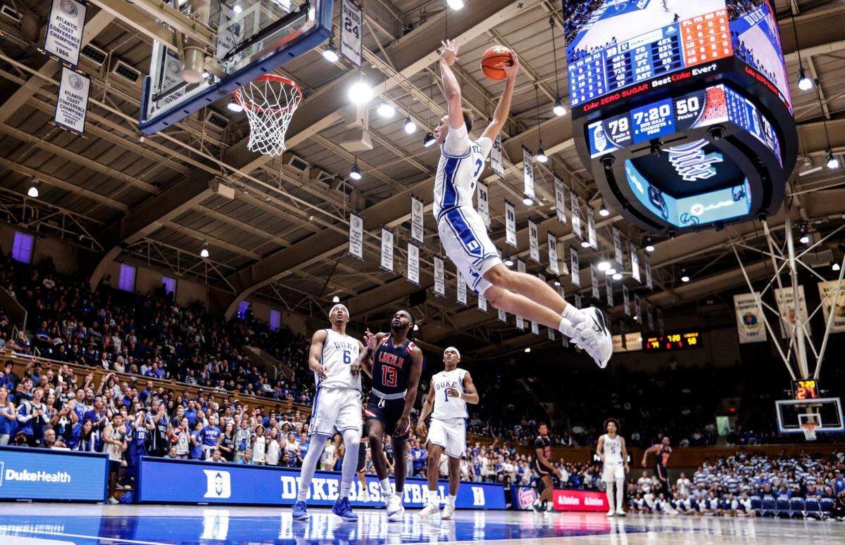 Duke’s Cooper Flagg (2) heads in to slam in two during Duke’s 107-56 exhibition victory over Lincoln (Pa) University at Cameron Indoor Stadium in Durham, N.C., Saturday, Oct. 19, 2024.