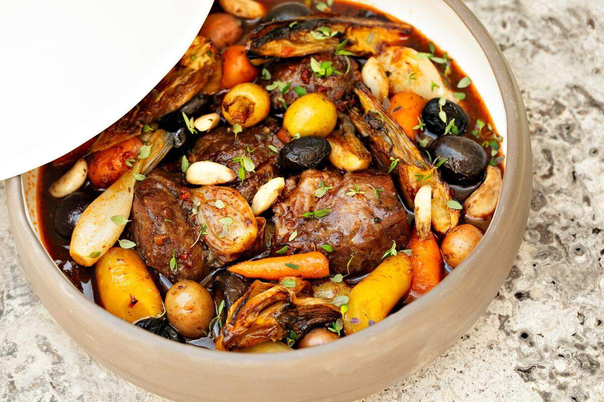 The braised lamb dish peka, cooked in a domed clay pot by the fire at Brodeto.