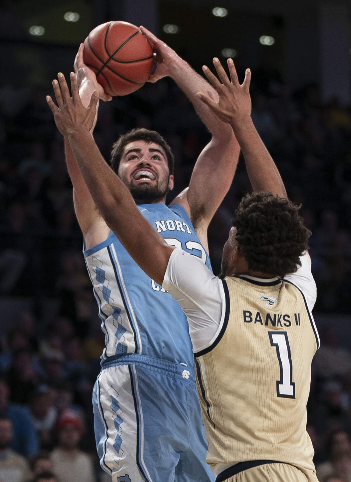 North Carolina’s Luke Maye (32) pus up a shot over Georgia Tech’s James Banks III (1) in the first half on Tuesday, January 29, 2019 at McCamish Pavilion in Atlanta, Georgia.