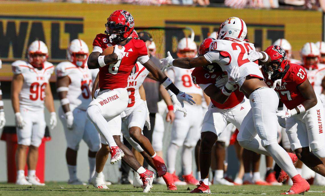 N.C. State’s Julian Gray (8) breaks free for a touchdown on a 82-yard kickoff return during the second half of the Wolfpack’s 45-7 victory over VMI at Carter-Finley Stadium in Raleigh, N.C., Saturday, Sept. 16, 2023.