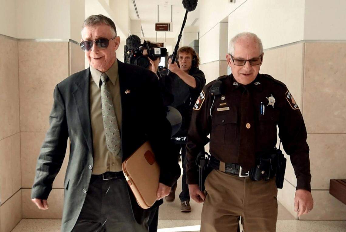 Durham County sheriff’s deputy Officer R. Adler escorts Michael Peterson to the elevators with his documentary crew in tow at the Durham County Courthouse, in Durham, N.C. Friday, Feb. 24, 2017. Peterson took an Alford plea to a charge of voluntary manslaughter in the death of his wife Kathleen Peterson on Dec. 9, 2001. Taking an Alford plea, a defendant can maintain his or her innocence while acknowledging prosecutors have enough evidence for a conviction. During a press conference afterwards Peterson maintained his innocence and claimed malfeasance by the Durham police department and SBI as the reasons for his conviction.